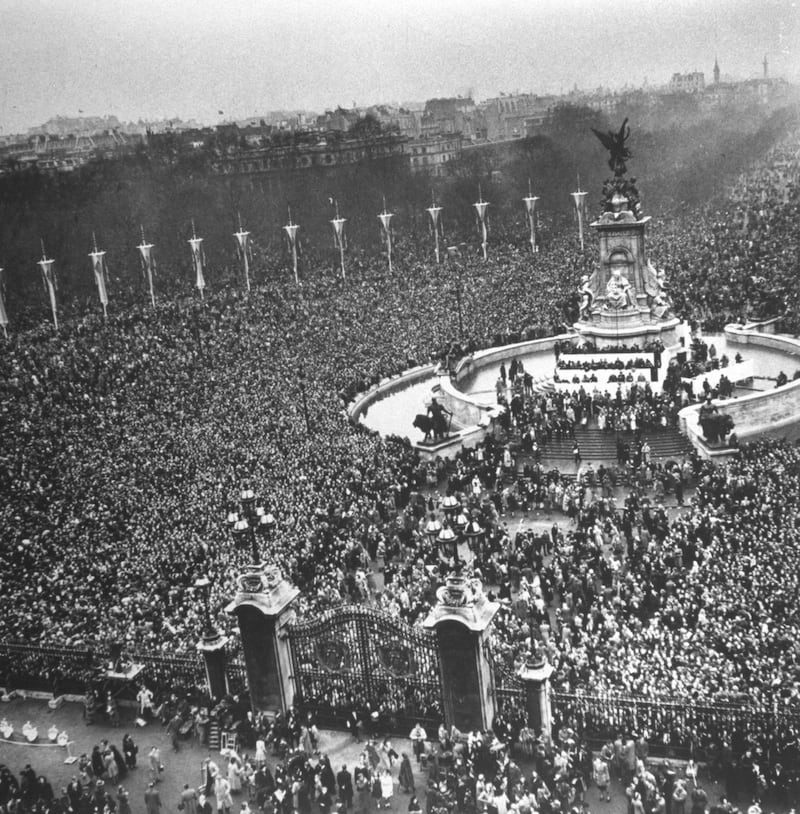 Crowds gathering outside Buckingham Palace on the wedding day of Elizabeth and Philip.  (Photo by Pat English/The LIFE Images Collection via Getty Images/Getty Images)