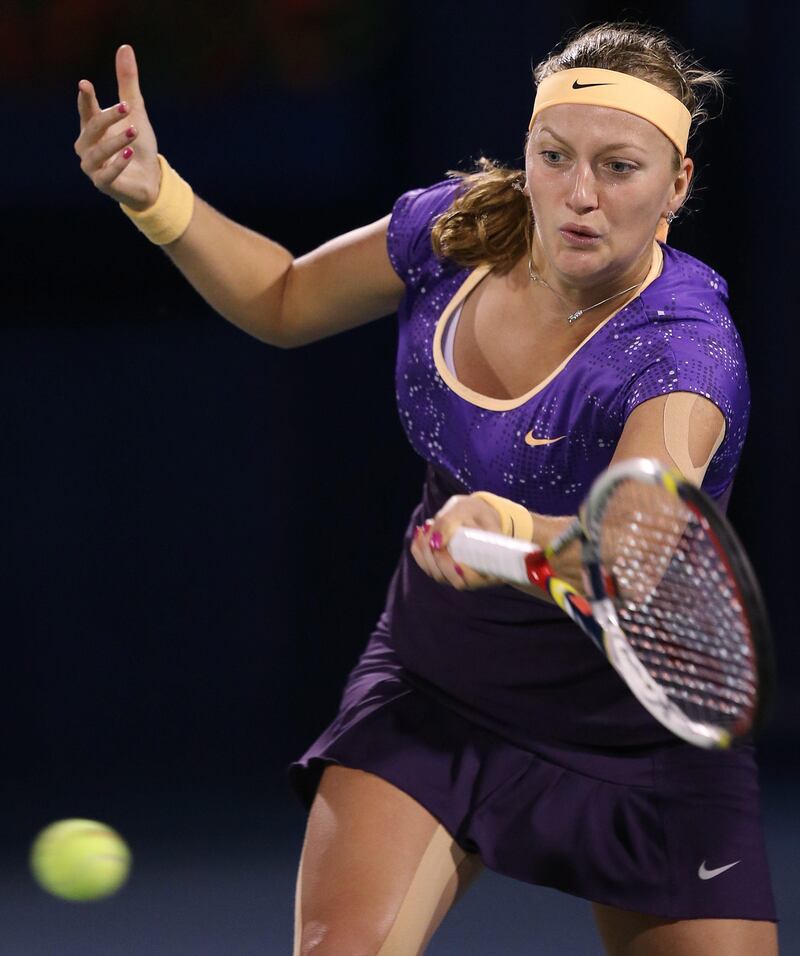 epa03594109 Czech Republic's Petra Kvitova returns the ball to Agnieszka Radwanska of Poland during their match on the fourth day of the Dubai Duty Free Tennis Championships in Dubai, United Arab Emirates, 21 February 2013.  EPA/ALI HAIDER *** Local Caption ***  03594109.jpg