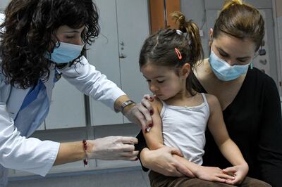 A health worker administers a measles vaccine in a hospital of Montenegro's capital Podgorica. AFP