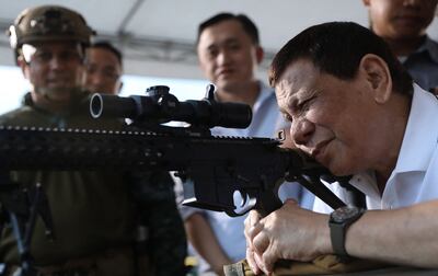 Former president Rodrigo Duterte, pictured in 2018, began to strike back as his successor chipped away at his policy legacies. AFP