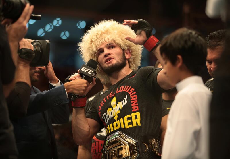 Khabib Nurmagomedov speaks to the media after beating Dustin Poirier at The Arena on Yas Island on Saturday. Reuters