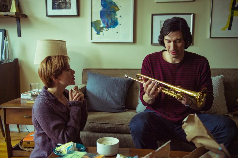 This image released by Netflix shows Scarlett Johansson, left, and Adam Driver in "Marriage Story."  (Netflix via AP)