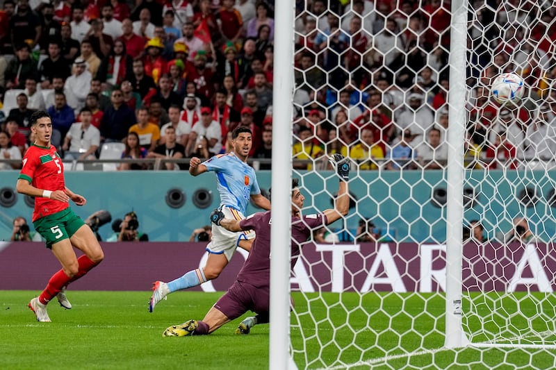 Spain's Marco Asensio hits the side netting with a shot. AP 