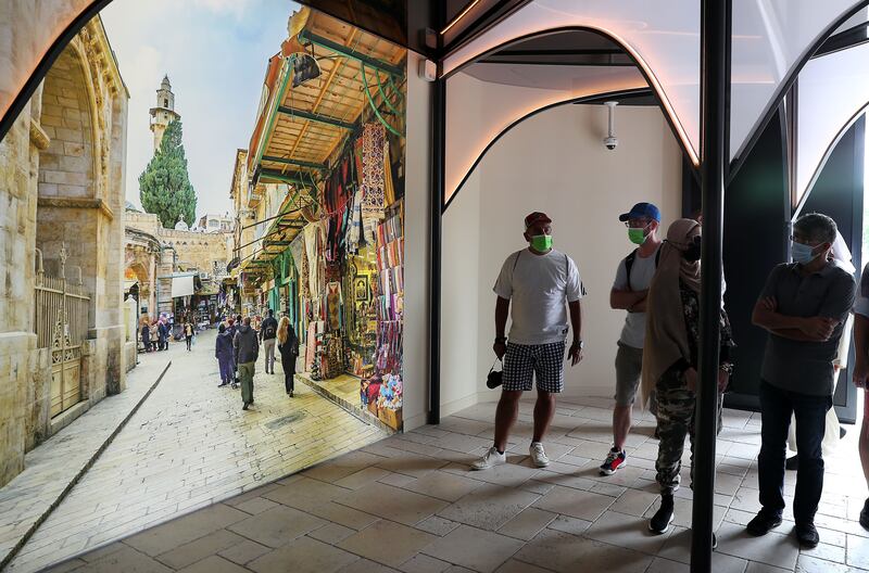 The first exhibit in the pavilion recreates the feel of the Old City of Jerusalem, with its narrow alleyways and decorative arches and screens.