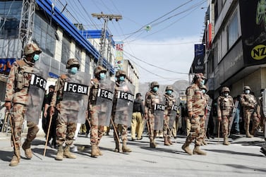 Security personnel patrol a street during a Shiite religious procession ahead of Ashura commemorations in Quetta on August 27, 2020. Photo: Banaras Khan / AFP