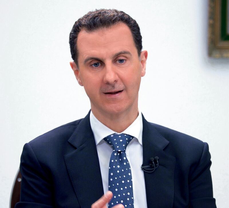 FILE - In this photo released by the Syrian official news agency SANA, Syrian President Bashar Assad, speaks during an interview with Hong-Kong based Phoenix TV in Damascus, Syria, March 11, 2017. The U.S. is seeking a political resolution to the crisis in Syria and doesnâ€™t insist on Assadâ€™s immediate ouster, President Donald Trumpâ€™s homeland and counterterrorism adviser said July 20, 2017. â€œI donâ€™t think itâ€™s important for us to say Assad must go first,â€ Tom Bossert said at the Aspen Security Forum, an annual gathering of intelligence and national security officials and experts.(SANA via AP)