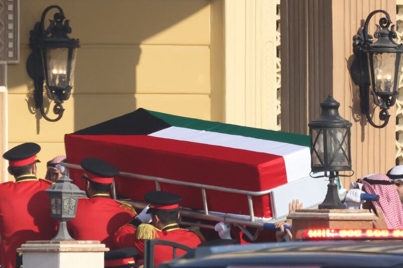 The coffin of Kuwait's late Emir Sheikh Nawaf Al Sabah is carried into the Bilal bin Rabah Mosque. AFP
