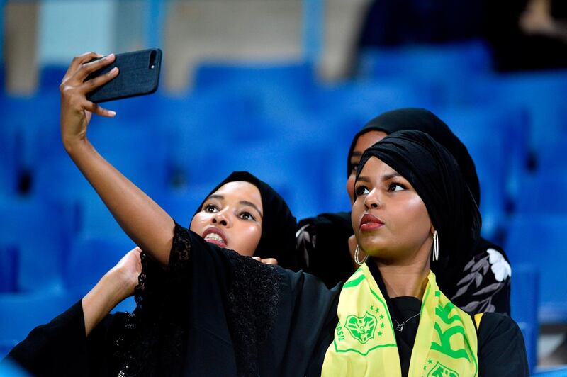 A Saudi women poses for a selfie. AFP