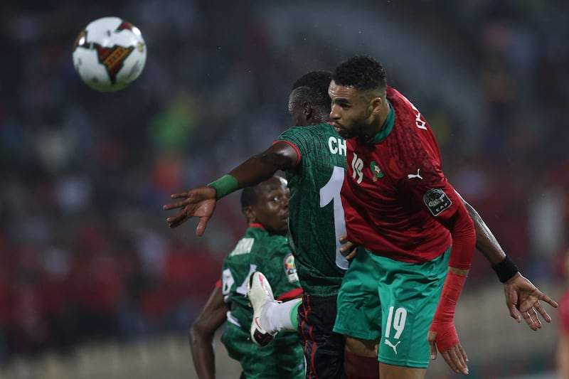 Morocco's forward Youssef En-Nesyri heads the ball. AFP
