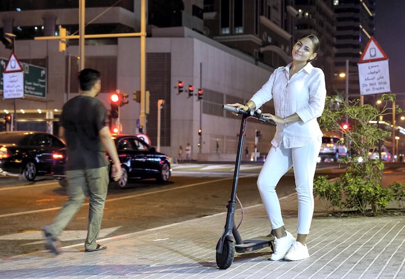Dubai, United Arab Emirates, August 1, 2019.  Genesis Martinez, owner of an e-scooter at Dubai.   
Victor Besa/The National
Section:  NA
Reporter:  Haneen Dajani