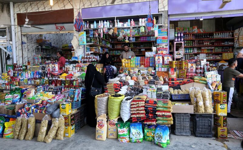 Iraqis shop for food during the holy month of Ramadan at market in western Baghdad, Iraq.  EPA