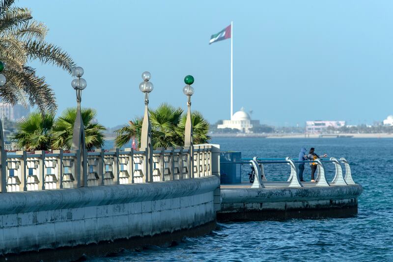 Abu Dhabi, United Arab Emirates, March 21, 2021.  Abu Dhabi residents catch some morning sun along the Corniche.
Victor Besa/The National
Section:  NA
FOR:  Stand Alone/Stock Images