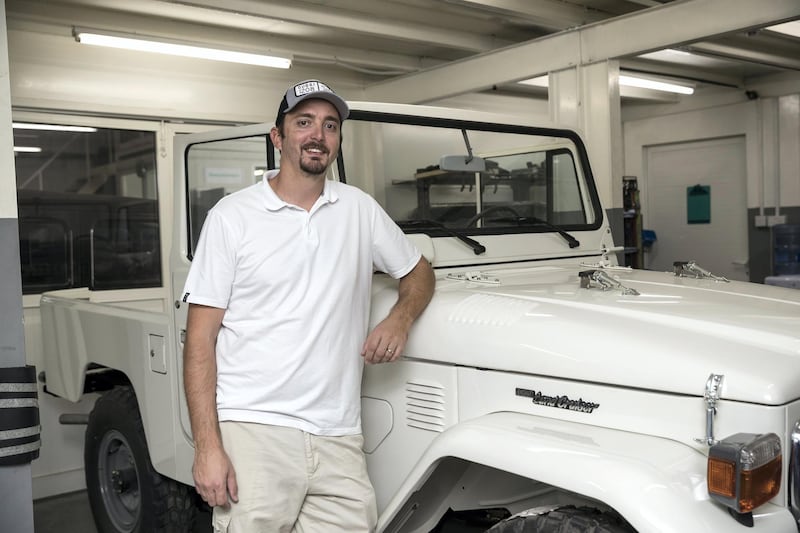 DUBAI, UNITED ARAB EMIRATES. 04 FEBRUARY 2018. Workshop visit to Dubai company Sebsports that restores vintage Land Rovers And Toyota Land Cruisers to concours standard at their Al Quoz workshop. Owner Seb Husseini shows off a current projetct. A Toyota Landcruiser, 1983 fj43 Soft Top that use to belong to the Ruler of Al Ain. (Photo: Antonie Robertson/The National) Journalist: Adam Workman. Section: Motoring.