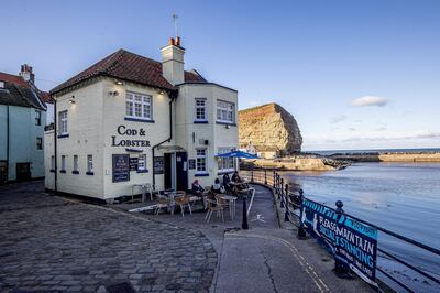 Tuesday 3rd  November 2020
Picture Credit Charlotte Graham 

Picture Shows The Pub Crab & Lobster 

Staithes is a seaside village in the Scarborough borough of North Yorkshire, England. Easington and Roxby Becks, two brooks that run into Staithes Beck, form the border between the Borough of Scarborough and Redcar and Cleveland. The area located on the Redcar and Cleveland side is called Cowbar

