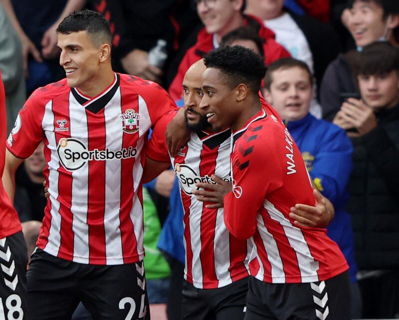 Nathan Redmond celebrates scoring their first goal with Mohamed Elyounoussi and Kyle Walker-Peters. Reuters