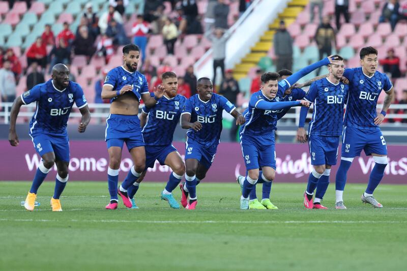 Hilal's players celebrate after winning the penalty shoot-out against Wydad during the Club World Cup second round match at the Prince Moulay Abdellah Stadium in Rabat on February 4, 2023. AFP