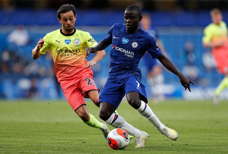 Chelsea's N'golo Kante under pressure from Bernardo Silva of Manchester City. Getty