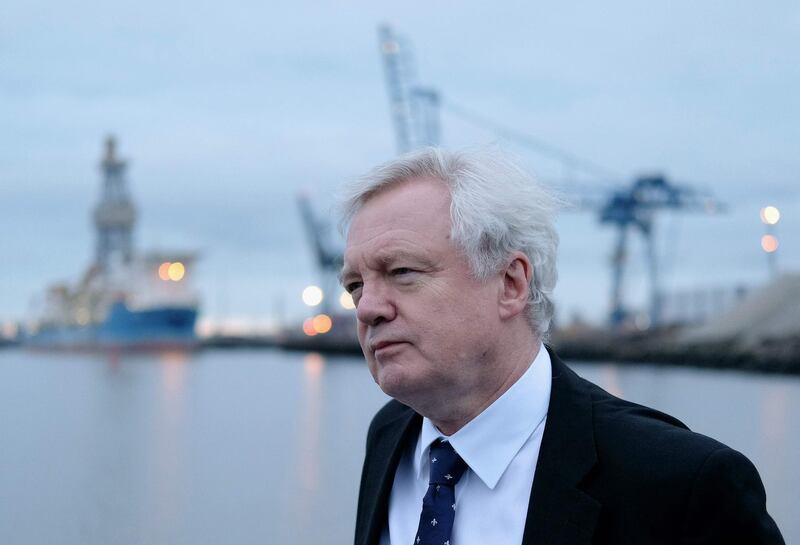 Britain's Secretary of State for Exiting the European Union (Brexit Minister) David Davis takes a trip along the River Tees after delivering a speech outlining the UK's ambitions for an implementation period after Brexit, during a visit to PD Ports at Teesport in Teesside, north west England on January 26, 2018.
Brexit minister David Davis sought to reassure eurosceptics on January 26, 2018, that Britain will forge its own path outside the EU, but admitted there were "different views" in the government after a senior colleague advocated close trading ties. / AFP PHOTO / POOL / Ian Forsyth