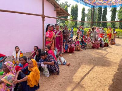 People queue to vote in state assembly elections in Kondagaon, Chhattisgarh state, India. AP