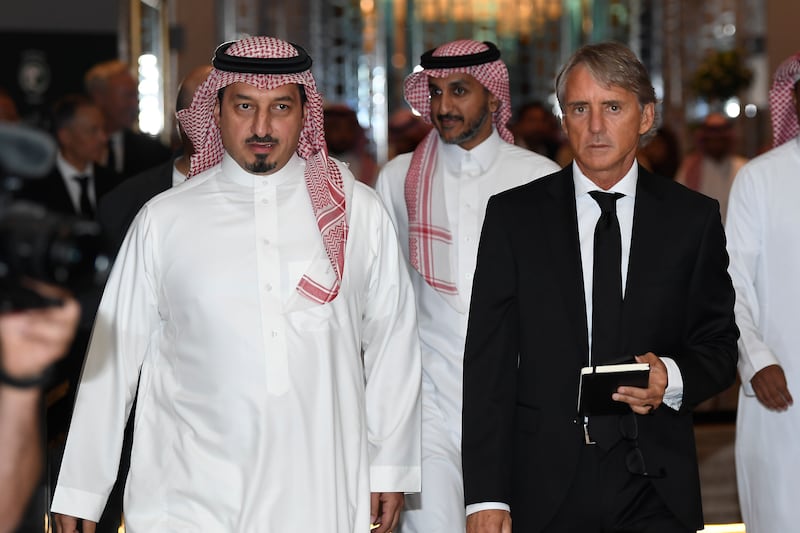 Roberto Mancini and Yasser Al Misehal, the Saudi Arabian Football Federation president, arrive for the press conference in Riyadh. AP