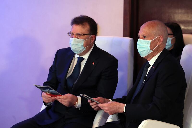 Tunisian President Kais Saied and Telnet CEO Mohamed Frikha attend the launch of Tunisia's first satellite ''Challenge-1''. EPA