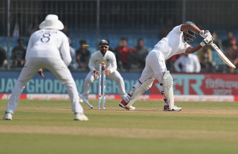 Bangladesh batsman Imrul Kayes is bowled out by India's Umesh Yadav. AP