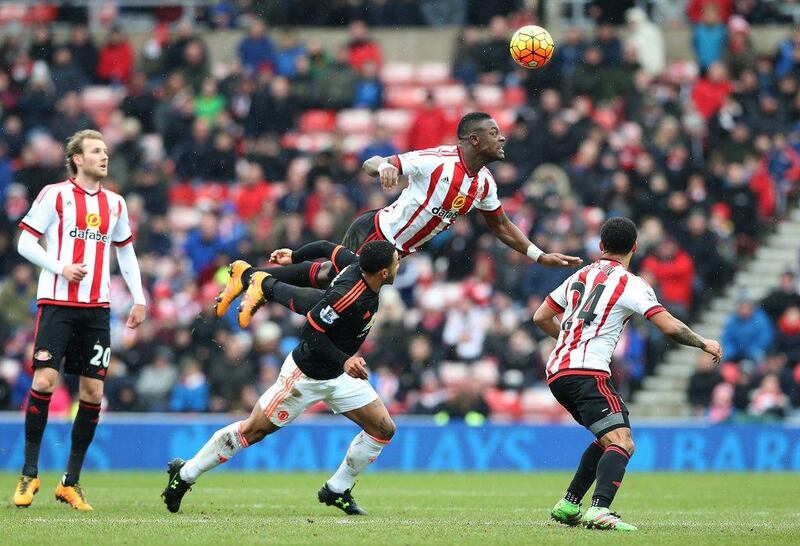 Manchester United's Memphis, second from left, challenged by Sunderland's Lamine Kone, top, during their English Premier League match at the Stadium of Light, Sunderland, Britain, 13 February 2016. EPA/NIGEL RODDIS