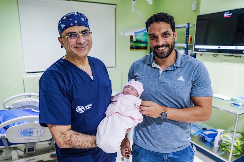Baby girl Hana with her father Eid Ahmed Mahmoud Hassane and Prof Walid El Sherbiny at Medeor Hospital, Abu Dhabi. Photo: Medeor Hospital
