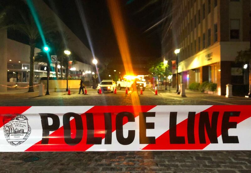 Police tape blocks a street leading to the Jacksonville Landing area in central Jacksonville. AFP