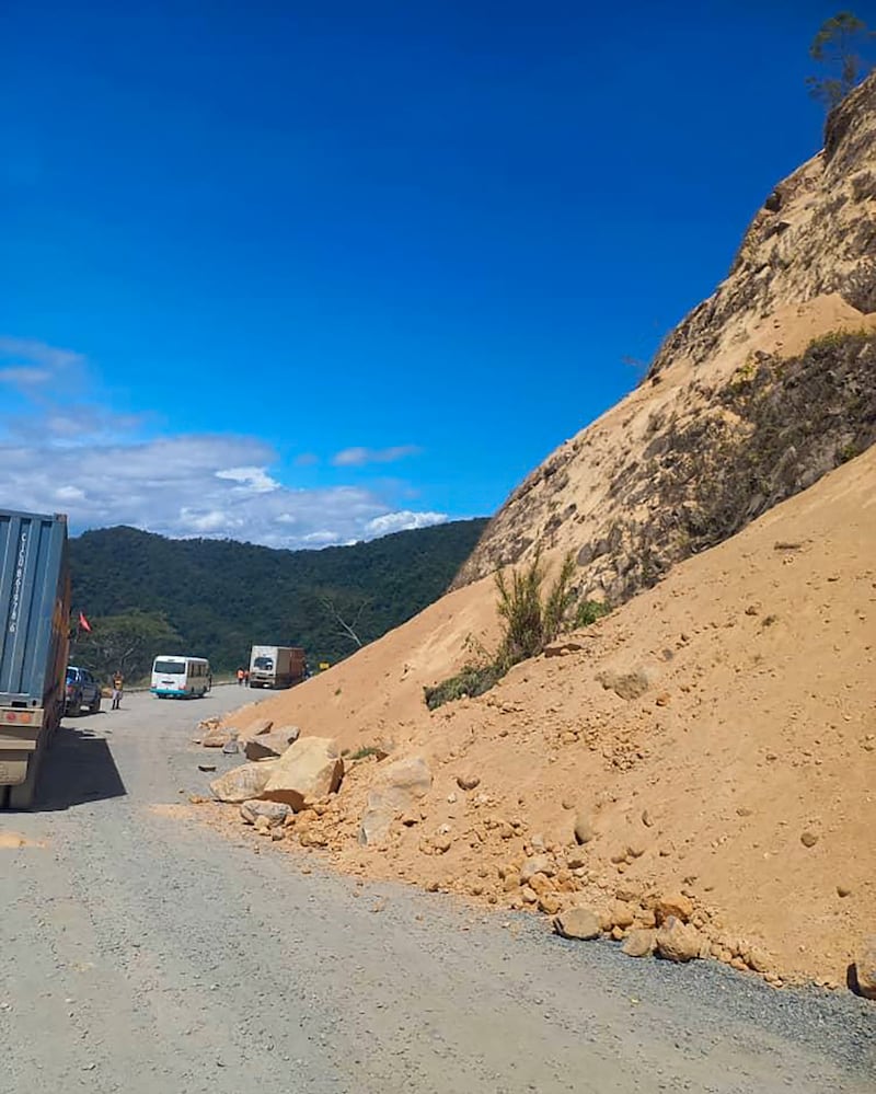 Debris lies strewn across a highway following a landslide near the town of Kainantu, following the quake.