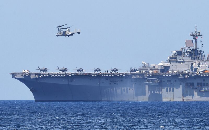 A US Osprey takes off from the USS Wasp, the navy's multipurpose amphibious assault ship. AFP