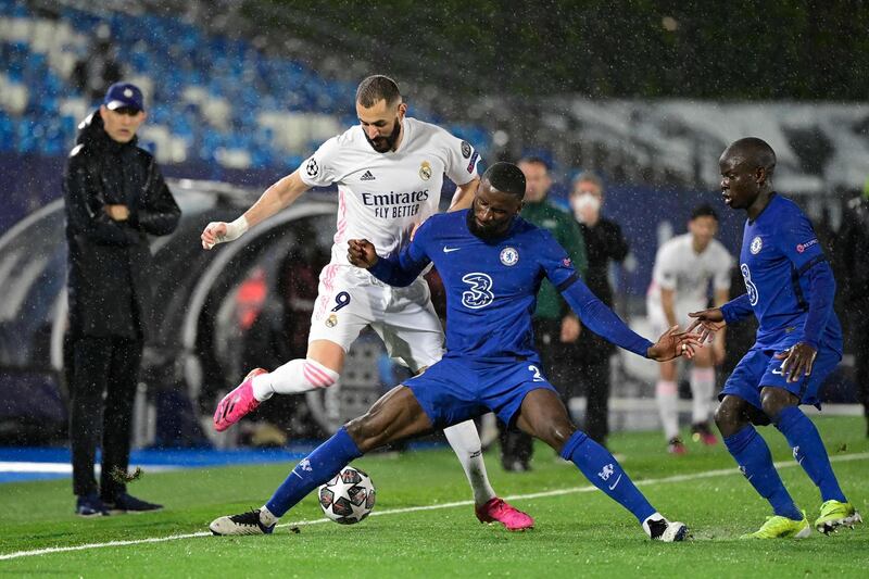 Chelsea's Antonio Rudiger challenges Real Madrid's Karim Benzema. AFP