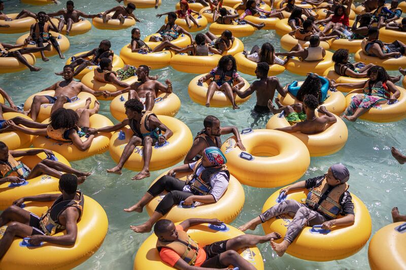 Holidaymakers on inflatable donuts at a water park in Bishoftu, 40km from Addis Ababa, Ethiopia. AFP