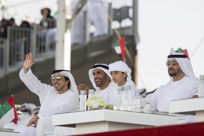 Sheikh Hamdan bin Zayed, Ruler’s Representative in the Western Region of Abu Dhabi, Sheikh Rashid bin Hamdan bin Zayed, right, Sheikh Nahyan bin Zayed, Chairman of the Board of Trustees of Zayed bin Sultan Al Nahyan Charitable and Humanitarian Foundation, second right, and Sheikh Mansour bin Zayed, Deputy Prime Minister and Minister of Presidential Affairs, attend the Sheikh Zayed Heritage Festival. Mohammed Al Hammadi / Crown Prince Court - Abu Dhabi