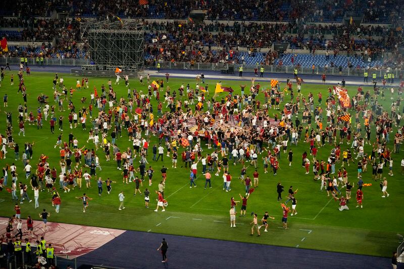 Supporters celebrate inside the Olympic Stadium in Rome. AP