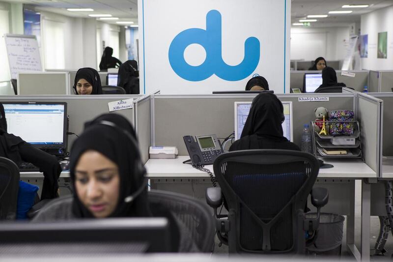 The 100 Emirati staff at the du call centre in Fujairah are celebrating three years since the centre opened its doors. Antonie Robertson / The National 