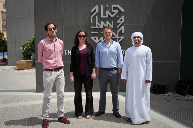 Abu Dhabi, United Arab Emirates - August 01 2013 - (L-R in winning order) National reporters Hareth Al Bustani, Emily Cleland, Kyle Sinclair and Thamer Al Subaihi after to the race to Dubai.  Four National reporters raced from Abu Dhabi to Dubai using various modes of transport to see which vehicle took the least time between two cities.  (Razan Alzayani / The National) 