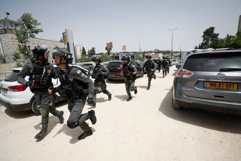 Israeli police on guard during the funeral procession. EPA