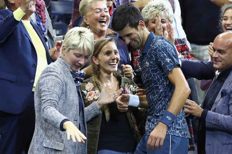 NEW YORK, NY - SEPTEMBER 09: Novak Djokovic of Serbia celebrates with his wife Jelena Djokovic after winning his men's Singles finals match against Juan Martin del Potro of Argentina on Day Fourteen of the 2018 US Open at the USTA Billie Jean King National Tennis Center on September 9, 2018 in the Flushing neighborhood of the Queens borough of New York City.   Al Bello/Getty Images/AFP
== FOR NEWSPAPERS, INTERNET, TELCOS & TELEVISION USE ONLY ==
