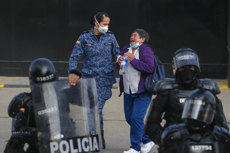 The relative of an inmate cries outside La Modelo jail in Bogota, Colombia. AP Photo