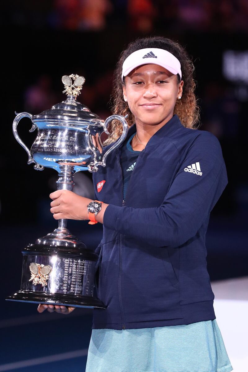 MELBOURNE, AUSTRALIA - JANUARY 26:  Naomi Osaka of Japan poses for a photo with the Daphne Akhurst Memorial Cup following victory in her Women's Singles Final match against Petra Kvitova of the Czech Republic during day 13 of the 2019 Australian Open at Melbourne Park on January 26, 2019 in Melbourne, Australia.  (Photo by Scott Barbour/Getty Images)