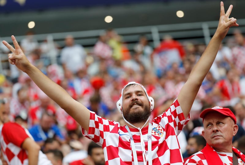 A supporter of Croatia before the start of the final. EPA