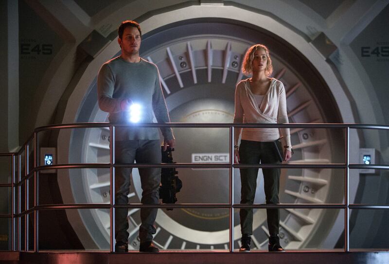 Chris Pratt and Jennifer Lawrence contemplate life alone on a ship floating in space in the film Passengers. Jaimie Trueblood / Columbia Pictures / Sony via AP 