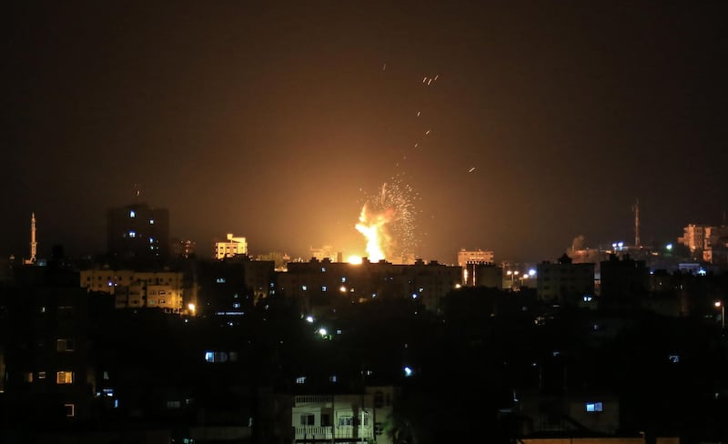 An explosion is seen in northern Gaza City after an airstrike by Israeli forces on June 20, 2018.  Israeli fighter jets hit 25 targets in the Gaza Strip early June 20 in response to rocket fire from the Palestinian territory, the army said.
 / AFP / ABED ABU RYASH
