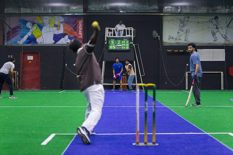 Dubai, United Arab Emirates, July 18, 2017:    A group of men play pick-up indoor cricket at the Insportz Club in the Al Quoz area of Dubai on July 18, 2017. Christopher Pike / The National

Reporter: Paul Radley
Section: Sport