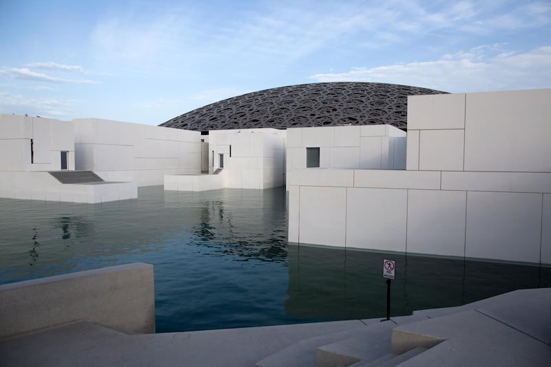 epa08295068 Exterior view of the closed Louvre Abu Dhabi museum in Abu Dhabi, United Arab Emirates, 15 March 2020. The United Arab Emirates shut down major tourism and cultural venues, including some parks, until 30 March 2020 amid the ongoing coronavirs pandemic.  EPA/MAHMOUD KHALED