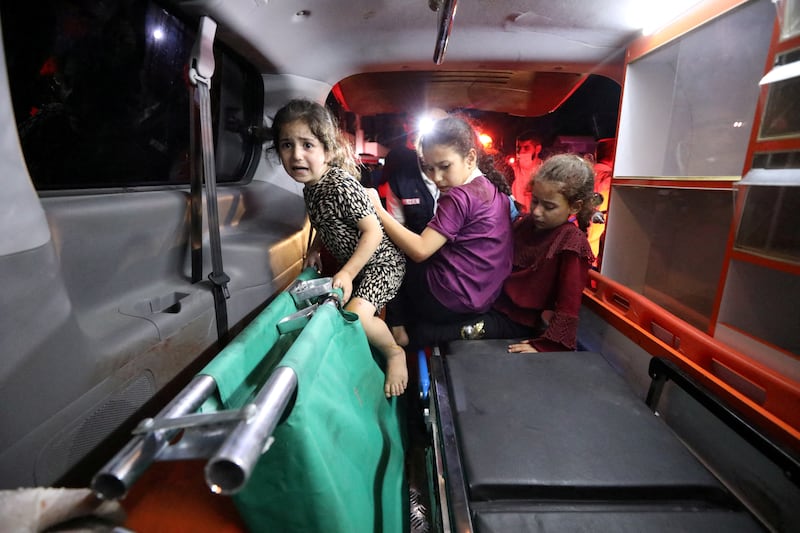 Children in an ambulance on the way to Al Shifa Hospital. Reuters