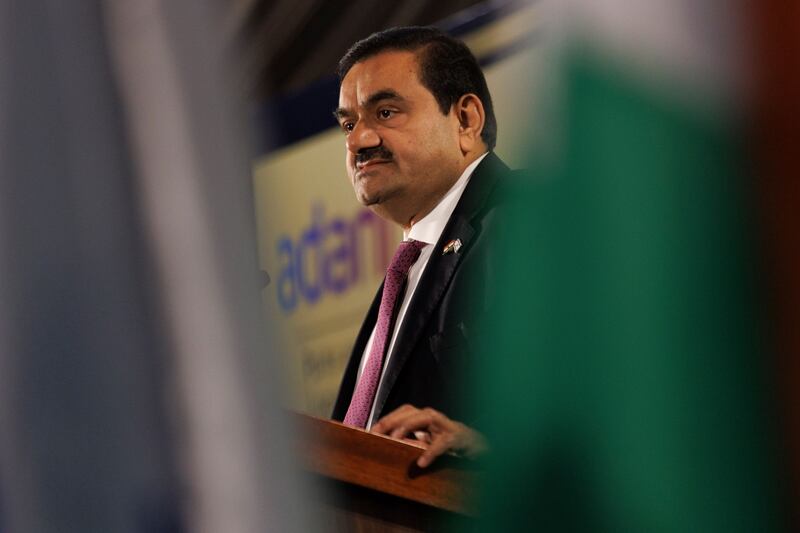 Gautam Adani's conglomerate is in talks with lenders to refinance a loan of up to $3.8 billion. Bloomberg