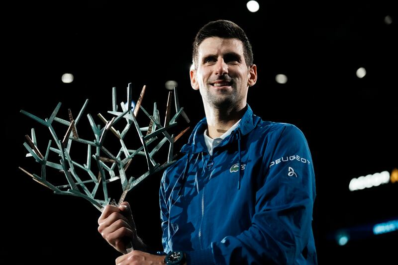 Serbia's Novak Djokovic holds his trophy after defeating Russia's Daniil Medvedev in the final . AP Photo