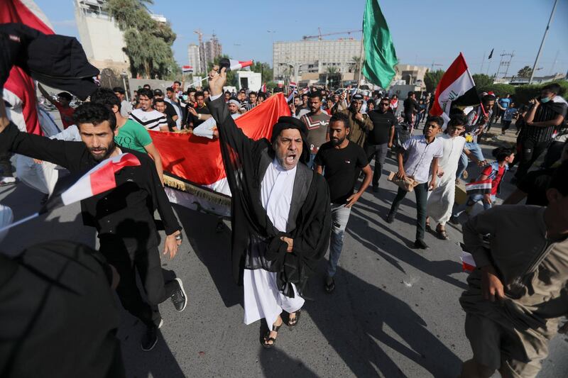 Demonstrators chant slogans during an anti-government protest at Tarbia square in Kerbala. Reuters